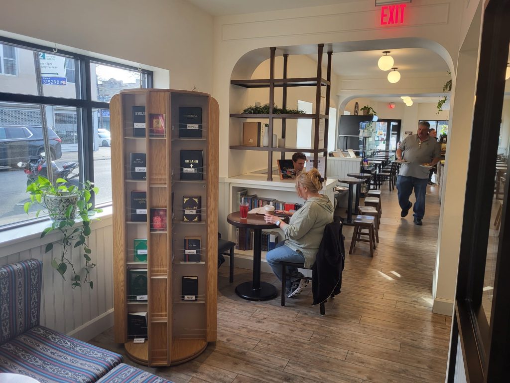 photo of books and bibles in a coffeeshop